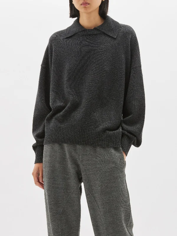 relaxed polo style knit Zippered Buttoned Snapped